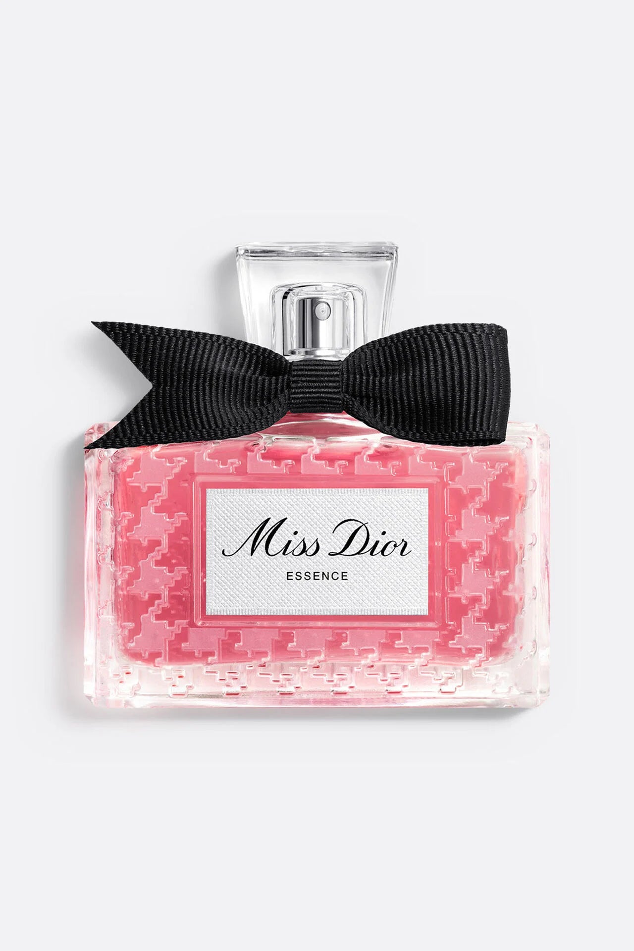 Miss Dior perfume bottle with a black bow on a white background